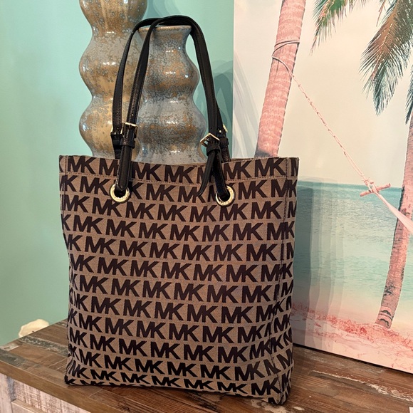 Michael Kors Handbags - Michael Kors Jet Set Brown Signature MK Tote Bag nice condition